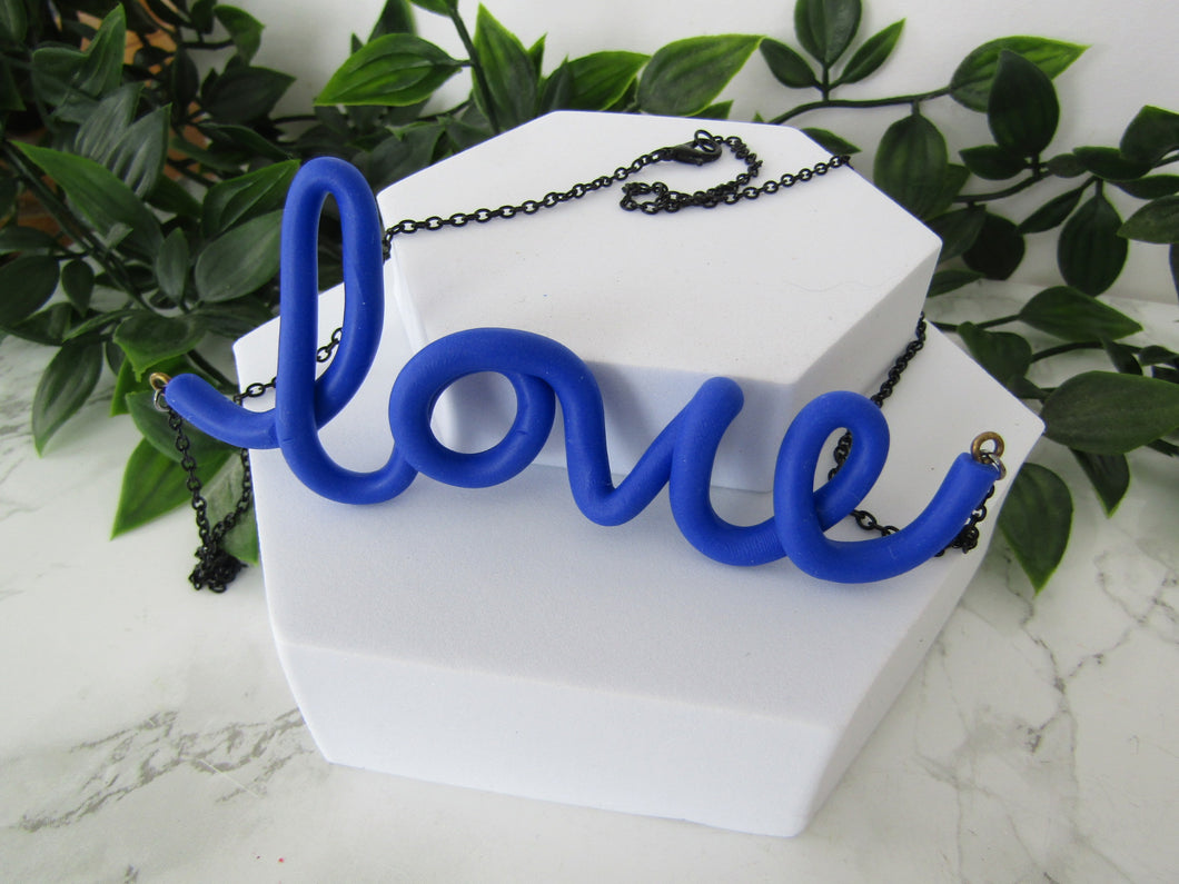 Induere | Handmade LOVE Necklace | Cursive Polymer Clay Word Pendant | Cobalt Blue
