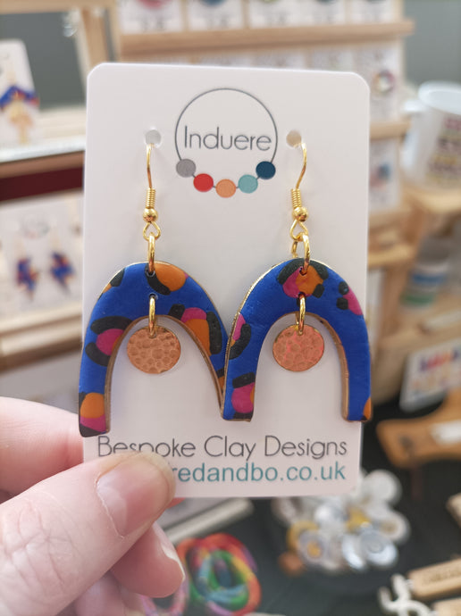 Induere Designs Polymer Clay Earrings| Blue Leopard Arch