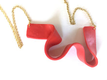 Induere Designs Statement Necklace - Coral Red Swoosh