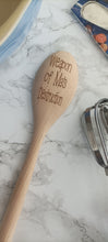 Wooden spoon engraved with 'weapon of Ma's destruction'