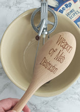 Wooden spoon engraved with 'weapon of Ma's destruction'