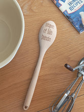 Wooden spoon engraved with 'weapon of Ma's destruction'