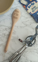 Wooden spoon engraved with 'weapon of Ma's destruction'