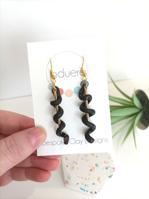 Induere Statement Polymer Clay Dangle Drop Earrings | Patsy | Black & Gold | clay Resin Twist with gold accents Dangle