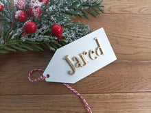 Personalised wooden gift tag for Christmas. Laser cut. Handmade in UK small personalised gift business. Keepsake gift