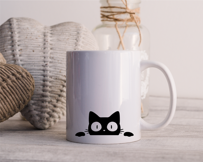 Sneaky cat ceramic mug