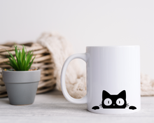 Sneaky cat ceramic mug