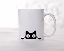 Sneaky cat ceramic mug