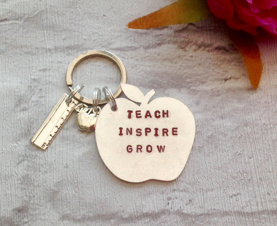 Teach Inspire Grow Apple hand stamped metal keyring with apple and ruler charms