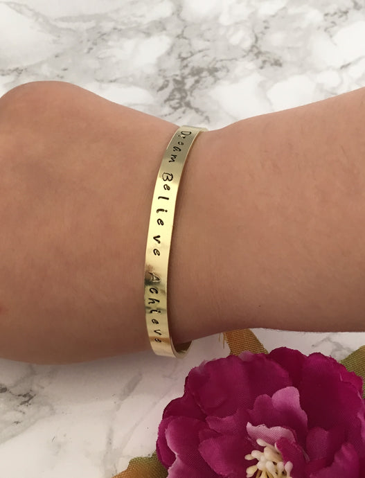 Hand stamped Brass cuff bangle - Dream Believe Achieve - positive mantra - Fred And Bo