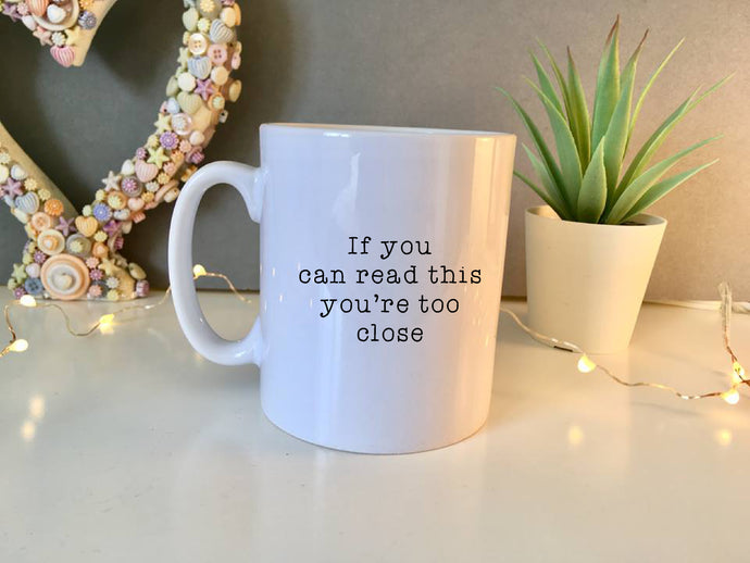 If you can read this you're too close ceramic mug